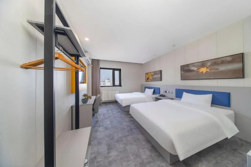 Bed in 7 Days Inn Tai'an Dongpingxi Hualian