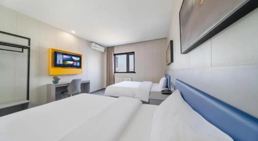 Bed in 7 Days Inn Tai'an Dongpingxi Hualian