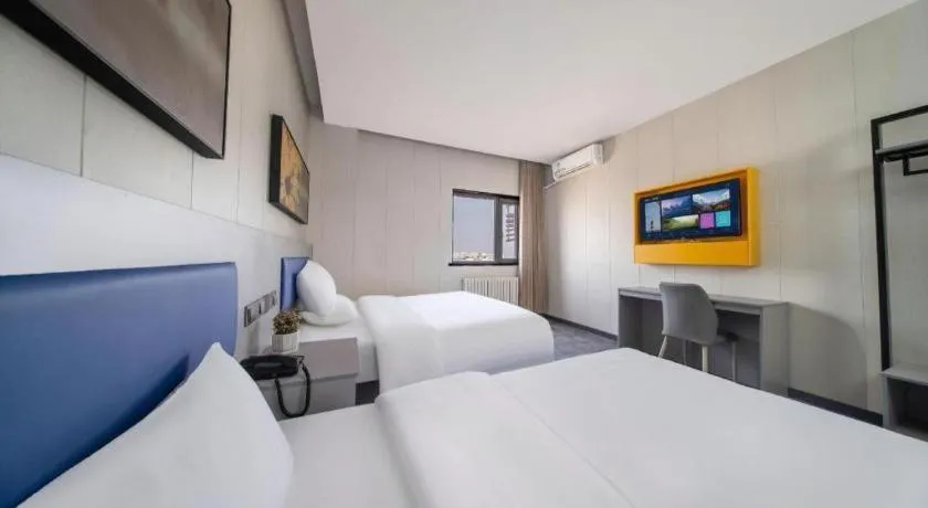 Bed in 7 Days Inn Tai'an Dongpingxi Hualian