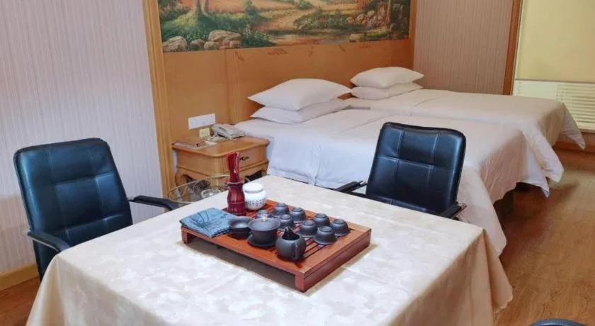 Bed in Vienna International Hotel Kunming Guangfu Road Aegean Shopping Center