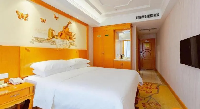 Bed in Vienna International Hotel Kunming Guangfu Road Aegean Shopping Center