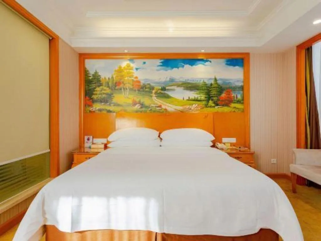 Bed in Vienna International Hotel Kunming Guangfu Road Aegean Shopping Center