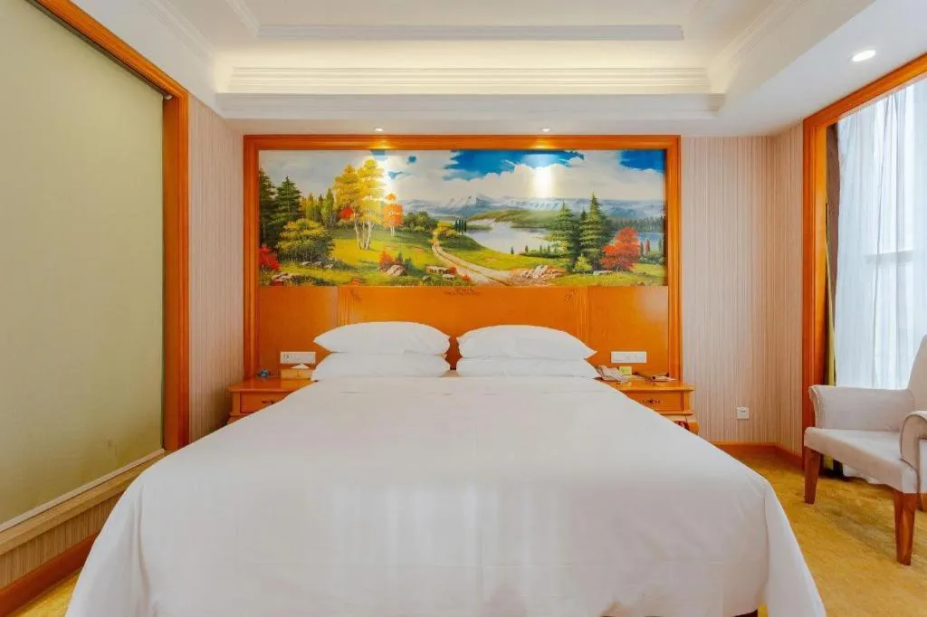 Bed in Vienna International Hotel Kunming Guangfu Road Aegean Shopping Center