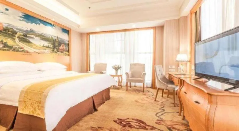 Bed in Vienna International Hotel Kunming Guangfu Road Aegean Shopping Center