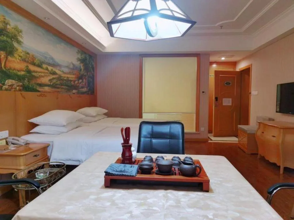 Bed in Vienna International Hotel Kunming Guangfu Road Aegean Shopping Center
