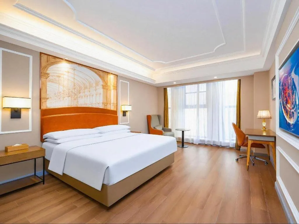 Bed in Vienna International Hotel Kunming Guangfu Road Aegean Shopping Center