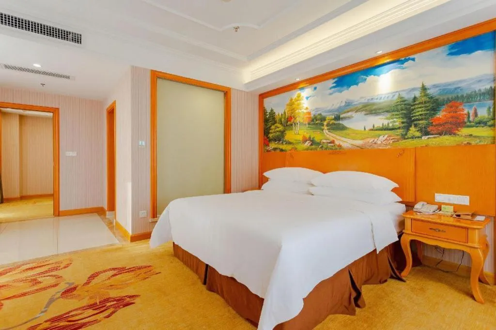 Bed in Vienna International Hotel Kunming Guangfu Road Aegean Shopping Center