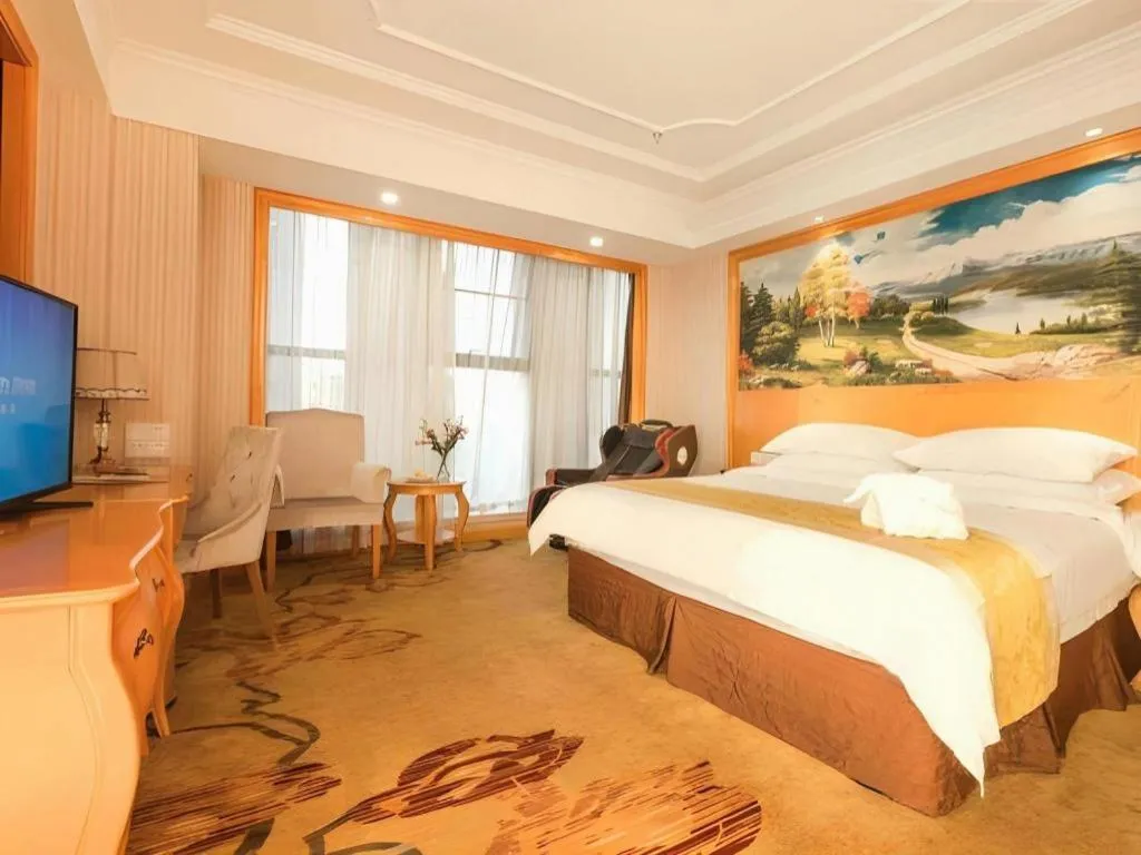 Bed in Vienna International Hotel Kunming Guangfu Road Aegean Shopping Center