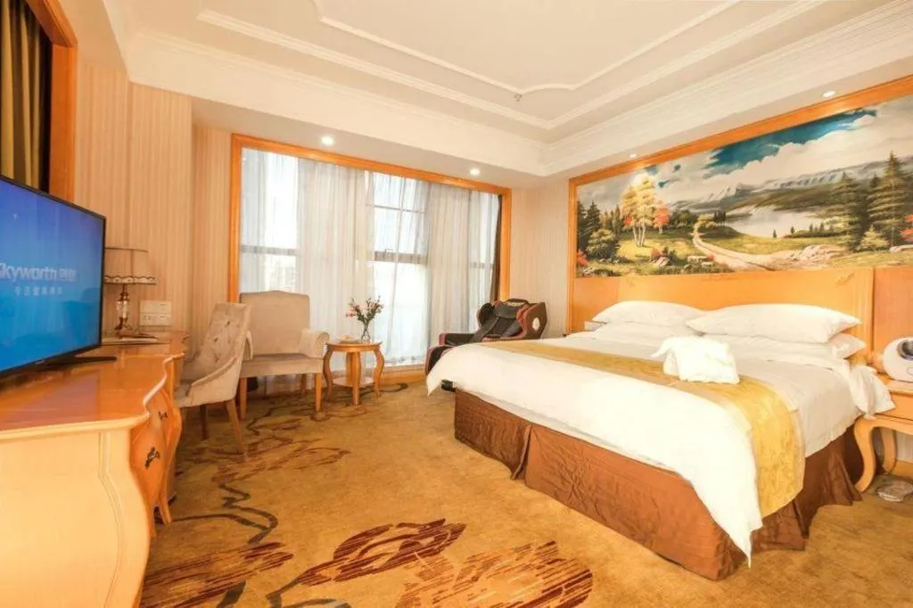 Bed in Vienna International Hotel Kunming Guangfu Road Aegean Shopping Center