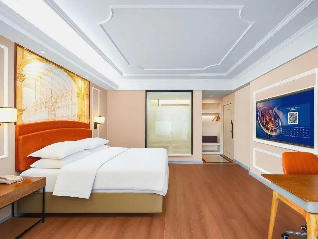 Bed in Vienna International Hotel Kunming Guangfu Road Aegean Shopping Center
