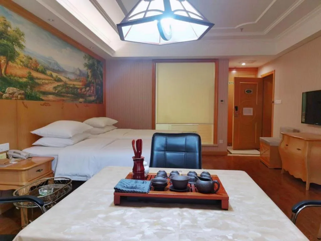 Bed in Vienna International Hotel Kunming Guangfu Road Aegean Shopping Center