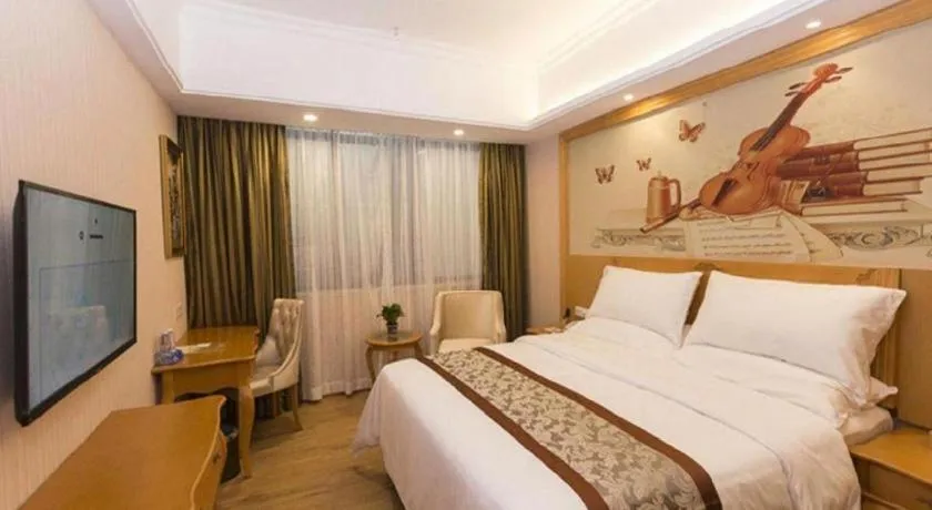 Bed in Vienna Hotel Guangzhou Airport Gaosu Pingsha