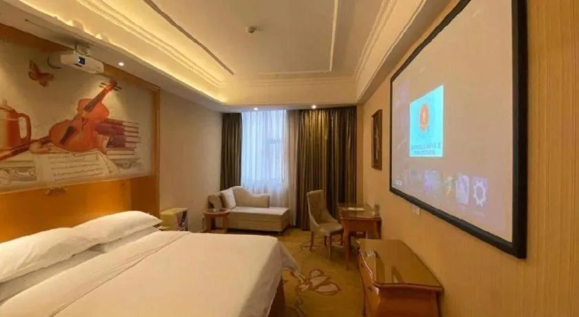 Bed in Vienna Hotel Guangzhou Airport Gaosu Pingsha