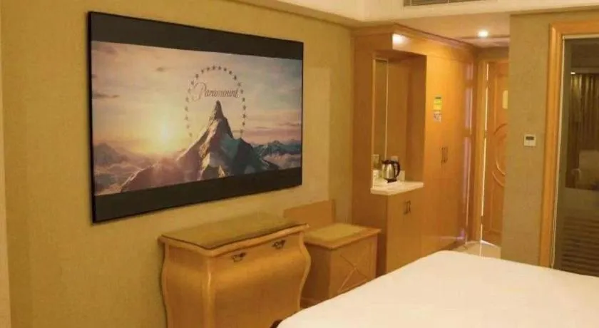 Bed in Vienna Hotel Guangzhou Airport Gaosu Pingsha