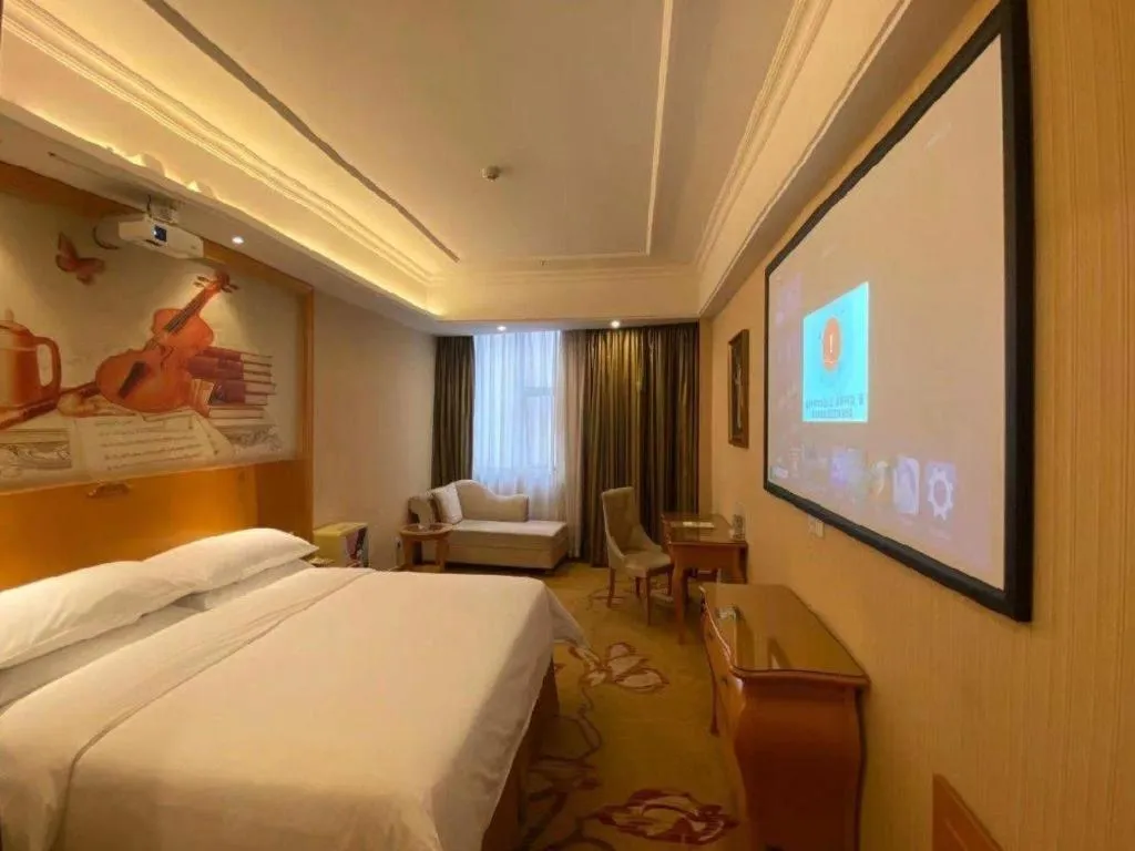 Bed in Vienna Hotel Guangzhou Airport Gaosu Pingsha