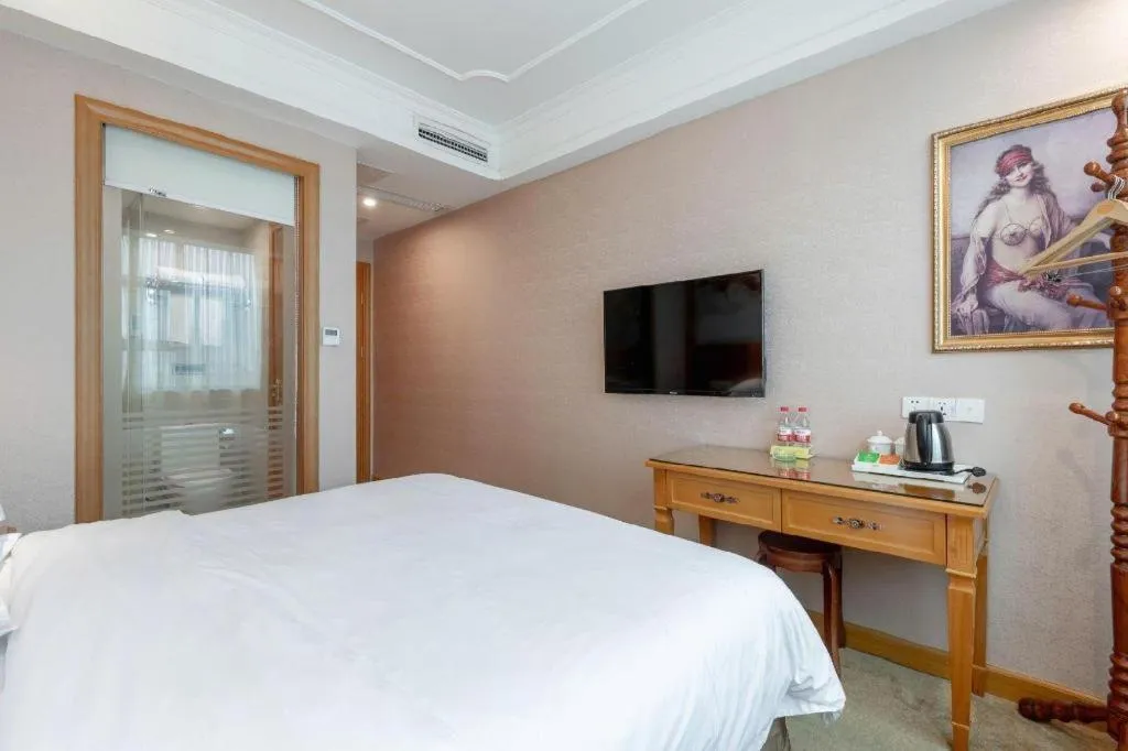 Bed in Vienna Hotel Changsha Wuyi Avenue Railway Station