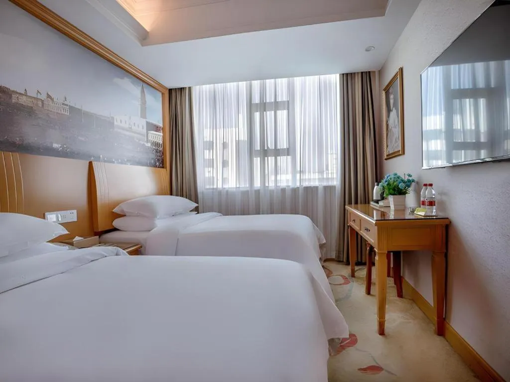 Bed in Vienna Hotel Changsha Wuyi Avenue Railway Station