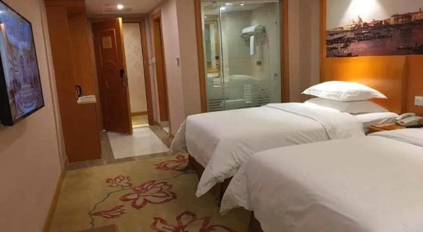 Bed in Vienna Hotel Changsha Wuyi Avenue Railway Station