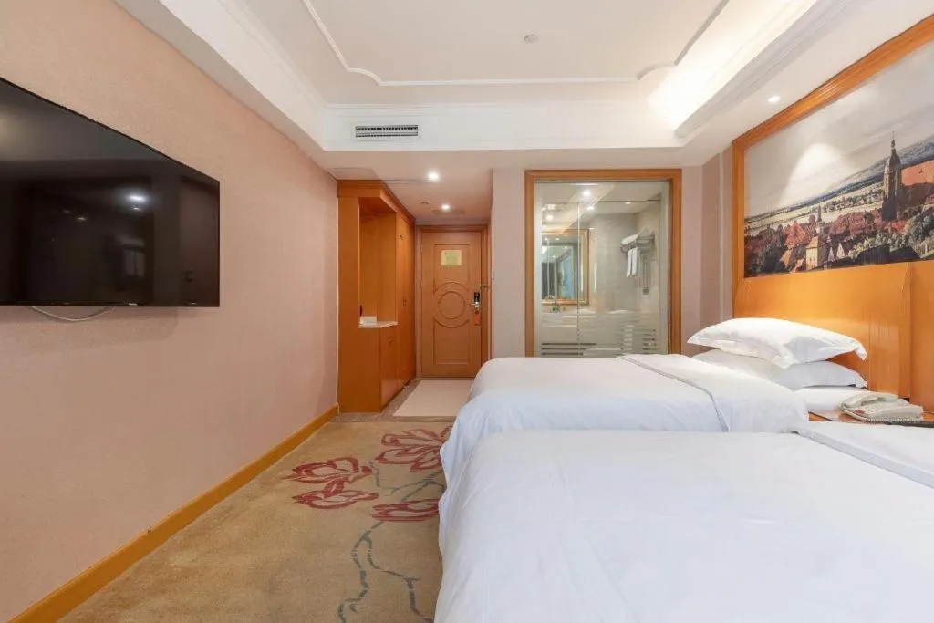 Bed in Vienna Hotel Changsha Wuyi Avenue Railway Station