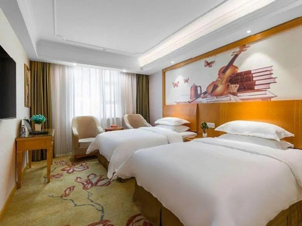 Bed in Vienna Hotel Changsha Wuyi Avenue Railway Station