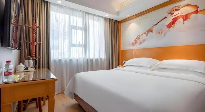 Bed in Vienna Hotel Changsha Wuyi Avenue Railway Station