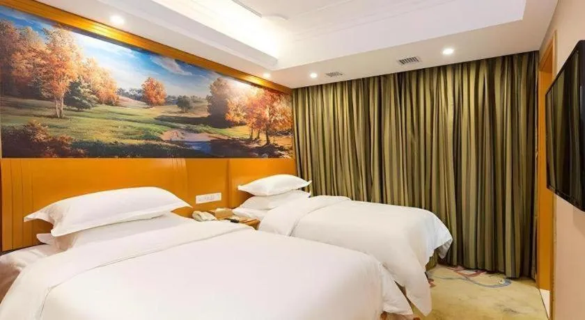 Bed in Vienna Hotel Changsha Wuyi Avenue Railway Station