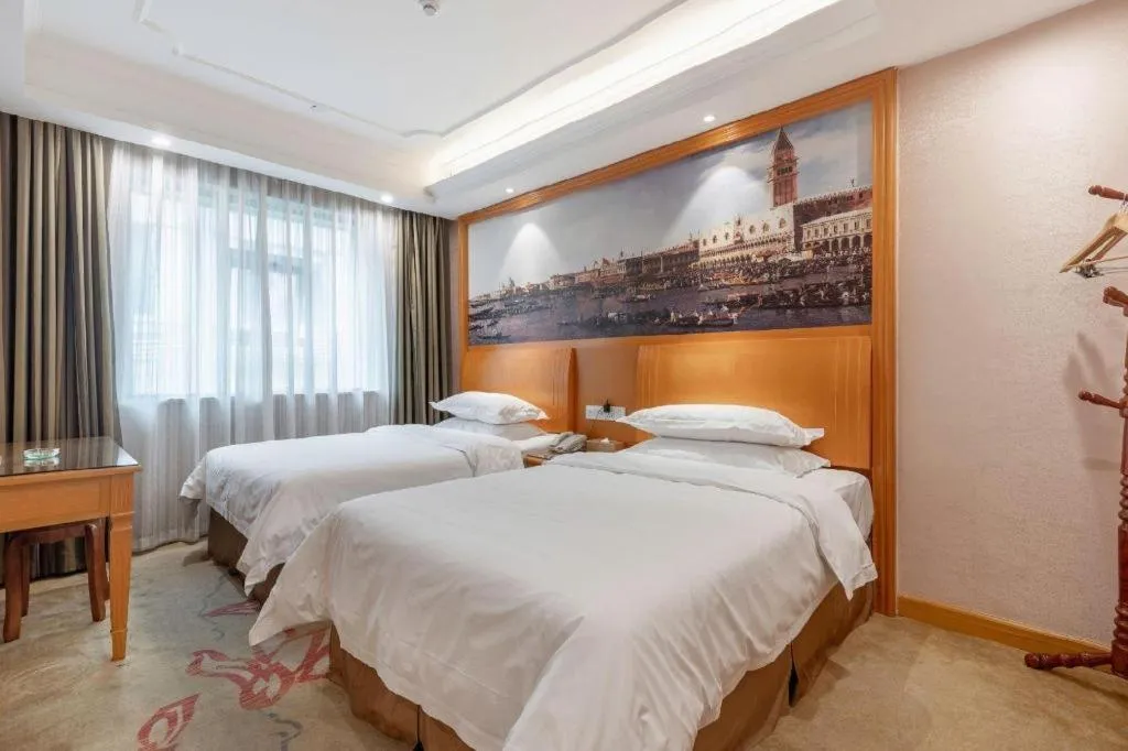 Bed in Vienna Hotel Changsha Wuyi Avenue Railway Station
