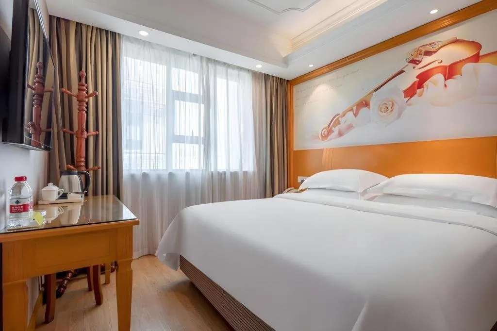 Bed in Vienna Hotel Changsha Wuyi Avenue Railway Station