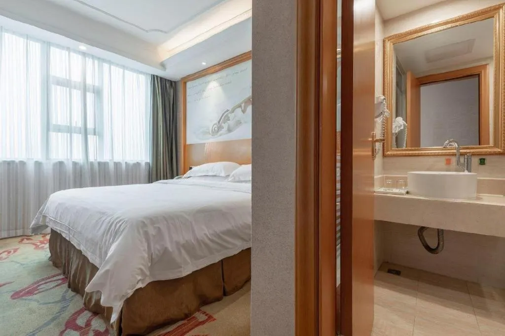 Bed in Vienna Hotel Changsha Wuyi Avenue Railway Station