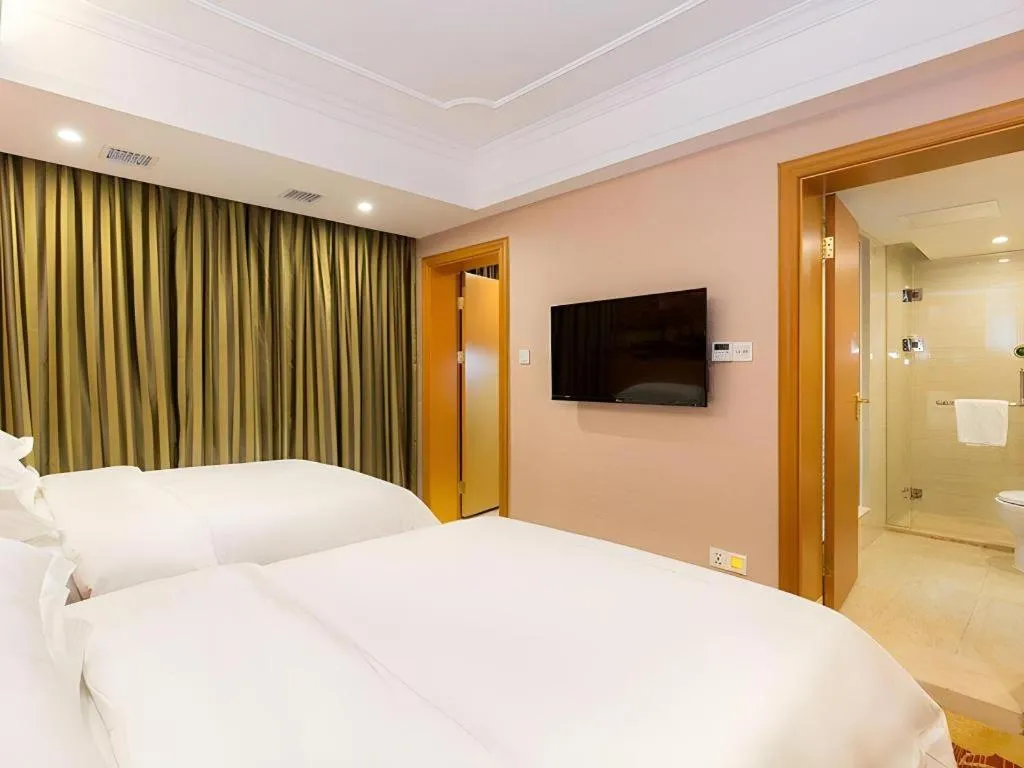 Bed in Vienna Hotel Changsha Wuyi Avenue Railway Station