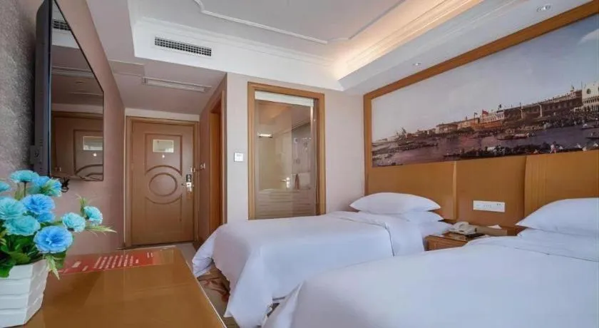 Bed in Vienna Hotel Changsha Wuyi Avenue Railway Station