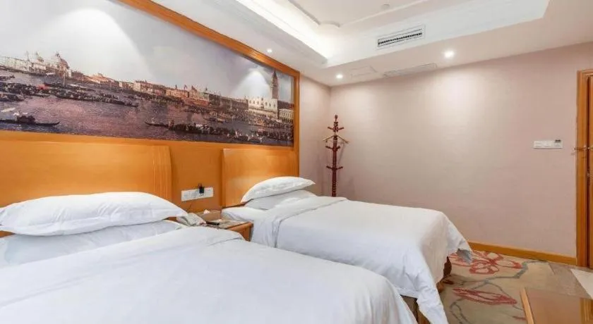 Bed in Vienna Hotel Changsha Wuyi Avenue Railway Station