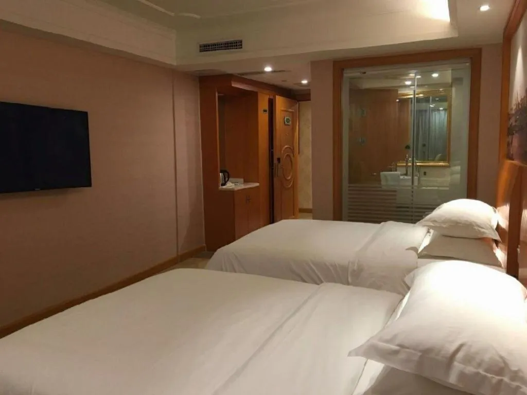 Bed in Vienna Hotel Changsha Wuyi Avenue Railway Station