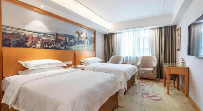 Bed in Vienna Hotel Changsha Wuyi Avenue Railway Station