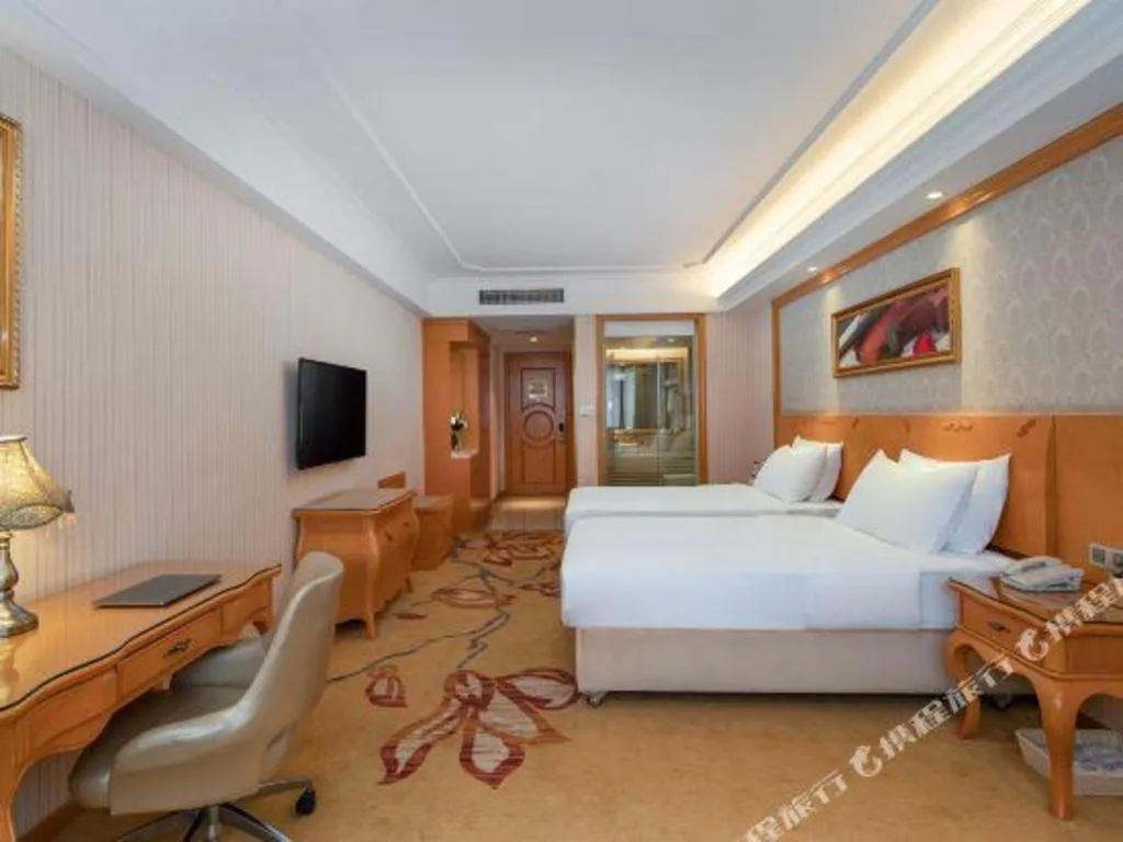 Bed in Vienna Hotel Chengdu Airport Shuangliu Wanda