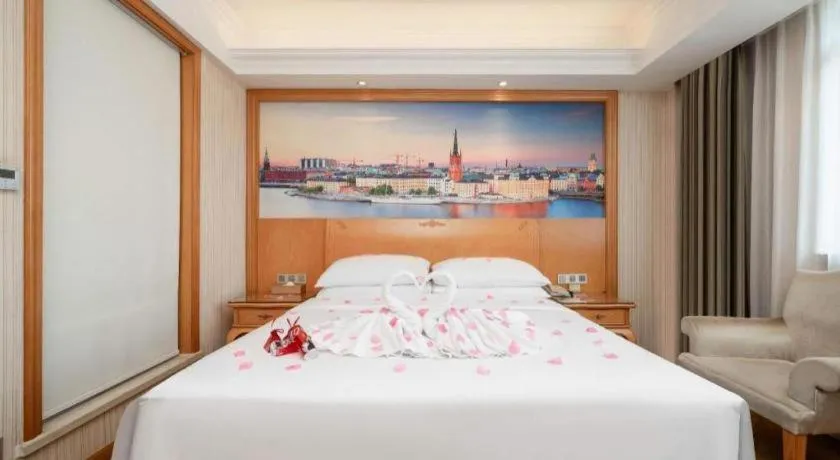 Bed in Vienna Hotel Chengdu Airport Shuangliu Wanda