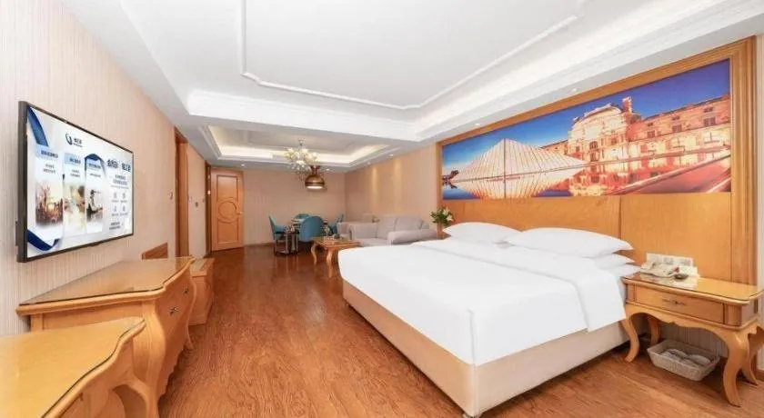 Bed in Vienna Hotel Chengdu Airport Shuangliu Wanda