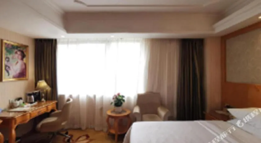 Bed in Vienna Hotel Chengdu Airport Shuangliu Wanda