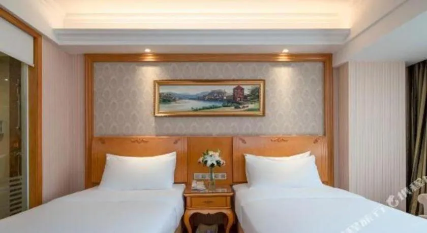 Bed in Vienna Hotel Chengdu Airport Shuangliu Wanda