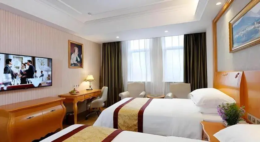 Bed in Vienna Hotel Chengdu Airport Shuangliu Wanda Bed in Vienna Hotel Chengdu Airport Shuangliu Wanda