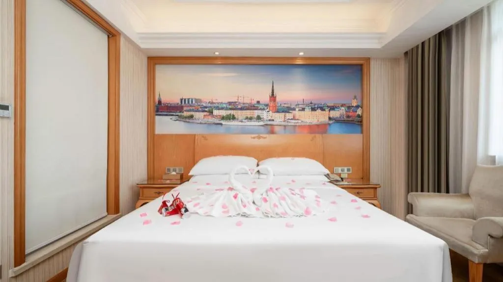 Bed in Vienna Hotel Chengdu Airport Shuangliu Wanda