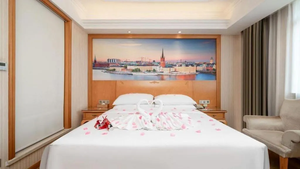 Bed in Vienna Hotel Chengdu Airport Shuangliu Wanda