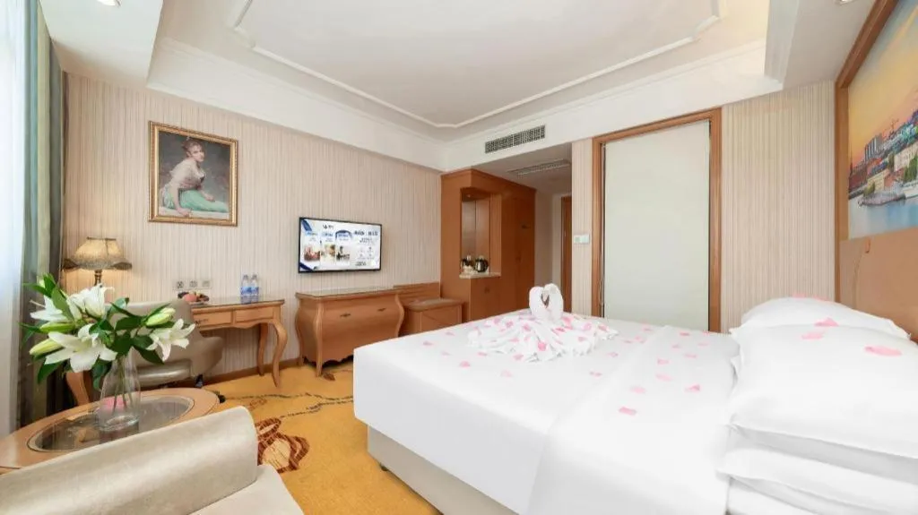 Bed in Vienna Hotel Chengdu Airport Shuangliu Wanda