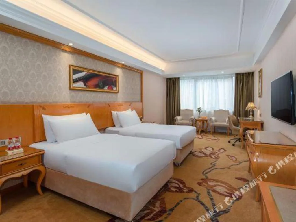 Bed in Vienna Hotel Chengdu Airport Shuangliu Wanda