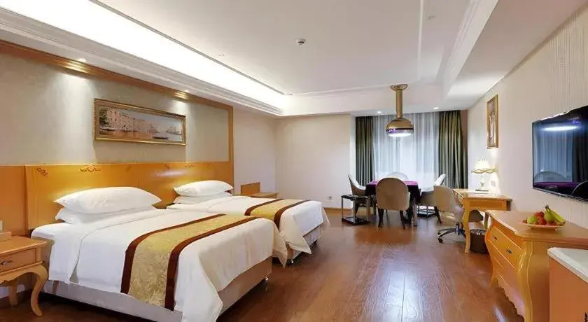 Bed in Vienna Hotel Chengdu Airport Shuangliu Wanda Bed in Vienna Hotel Chengdu Airport Shuangliu Wanda
