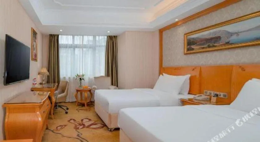 Bed in Vienna Hotel Chengdu Airport Shuangliu Wanda