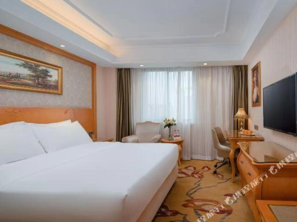 Bed in Vienna Hotel Chengdu Airport Shuangliu Wanda