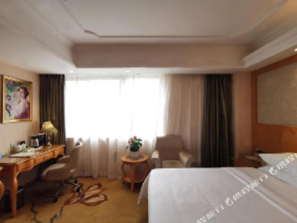 Bed in Vienna Hotel Chengdu Airport Shuangliu Wanda