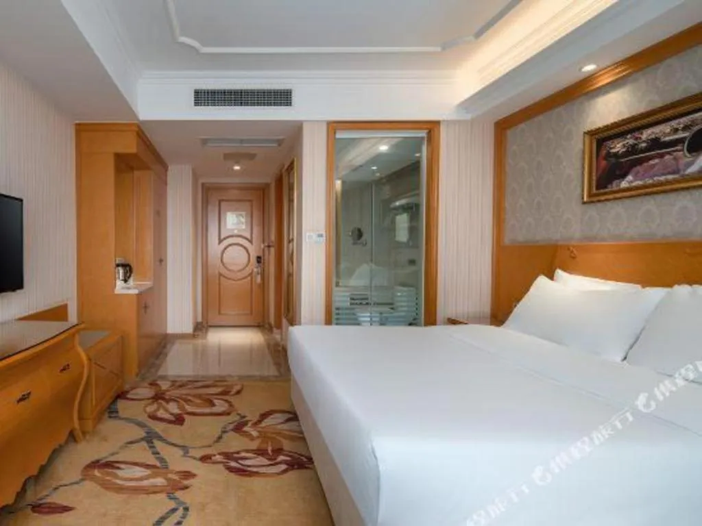 Bed in Vienna Hotel Chengdu Airport Shuangliu Wanda