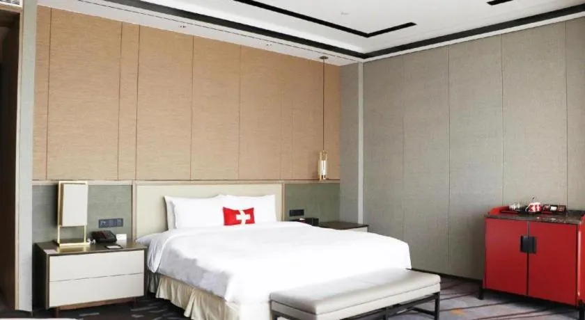 Bed in Swisstouches Hotel Ankang